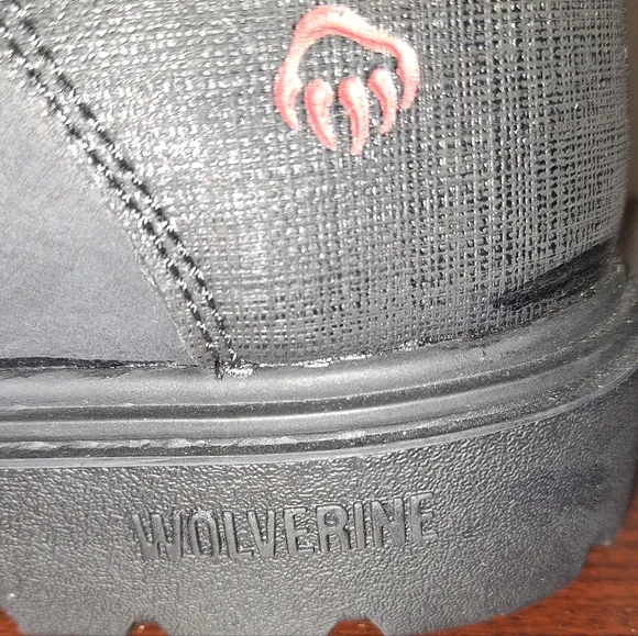 A pair of mens black Wolverine Steel Toe work boots NWOB in a size 8M.