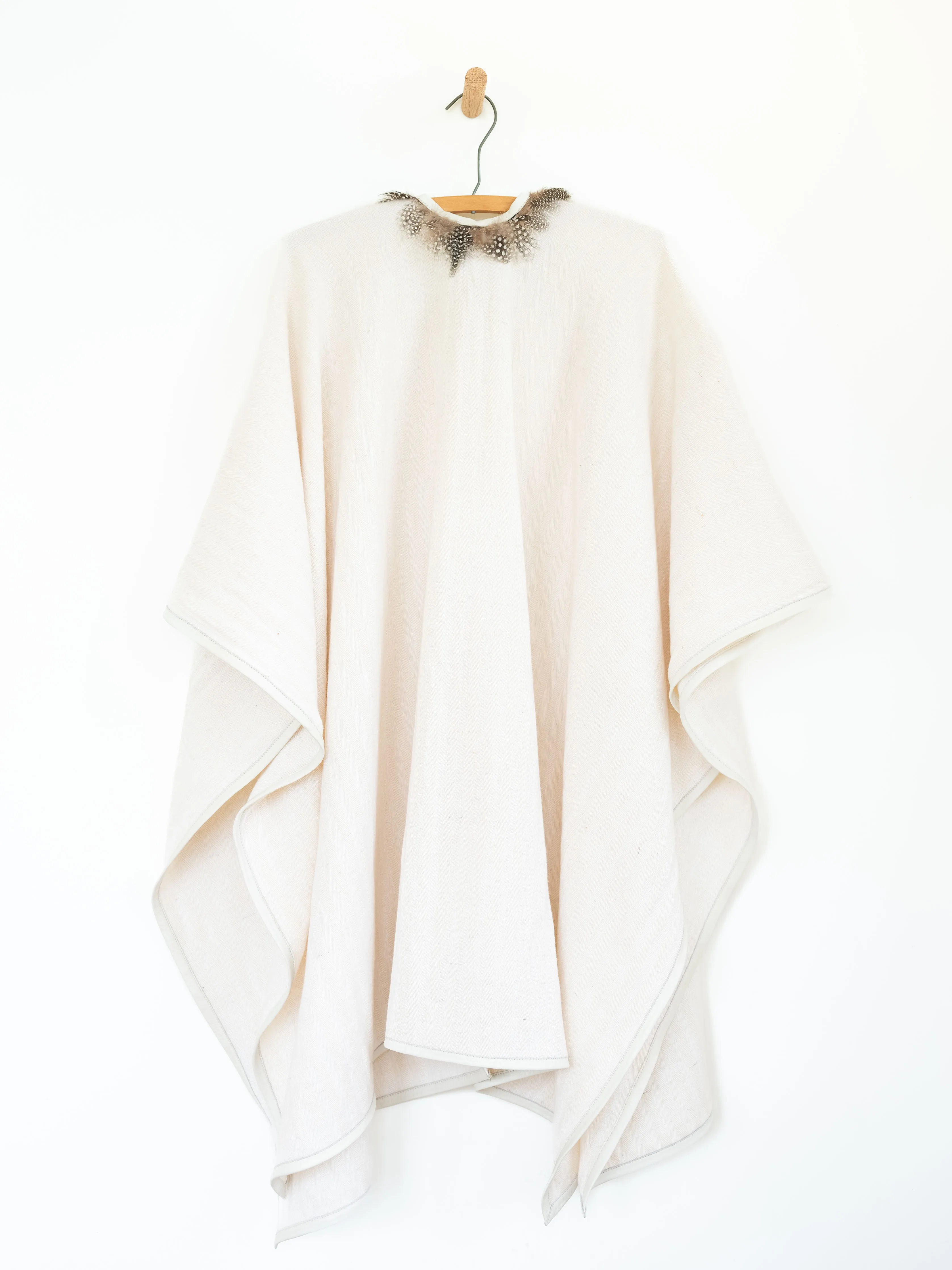 Cape with Guinea Feathers