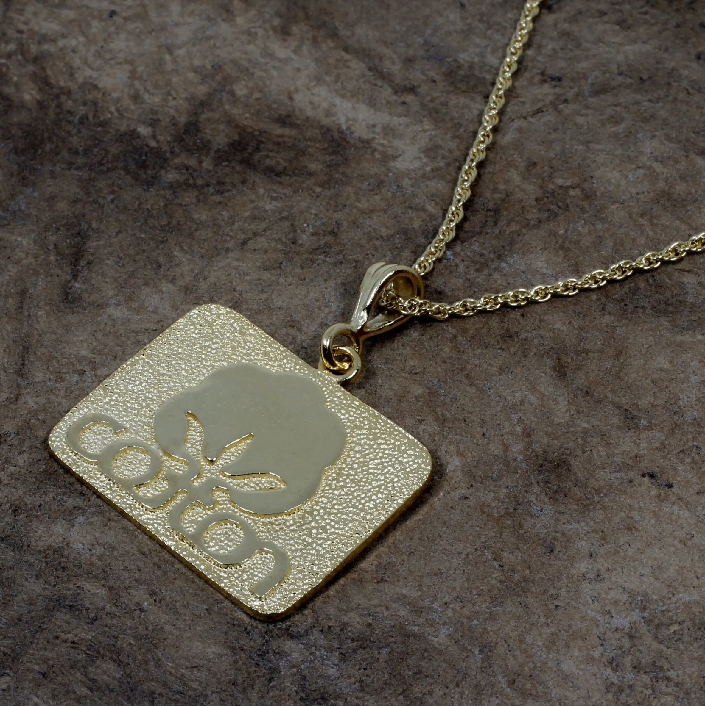 Large Gold Cotton Inc Necklace with Seal of Cotton Logo