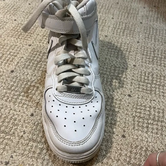 Nike Air Force 1 High Top Leather Sneakers.