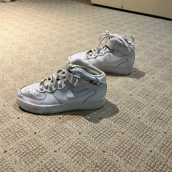 Nike Air Force 1 High Top Leather Sneakers.