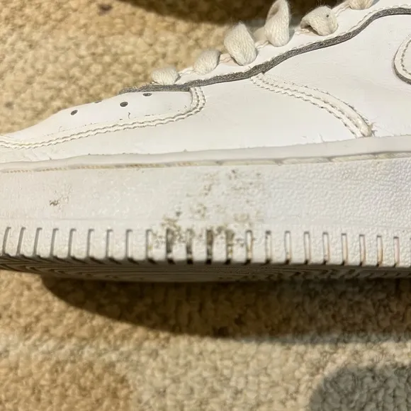 Nike Air Force 1 High Top Leather Sneakers.
